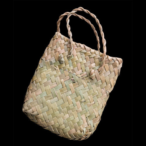 Hand carved Hei Toki jade pendant by Nick and Mady